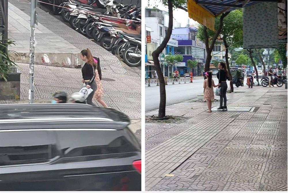 Chị đại quận 4 từng trả treo với CSGT tiếp tục bị chỉ trích khi không đeo khẩu trang, dắt con gái đi trên phố-3