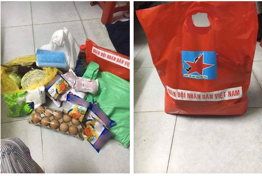 Trời tối mịt nhưng các anh bộ đội vẫn tiếp tục đi phát thực phẩm, chị em reo hò không ngớt dù đứng cách rất xa-2