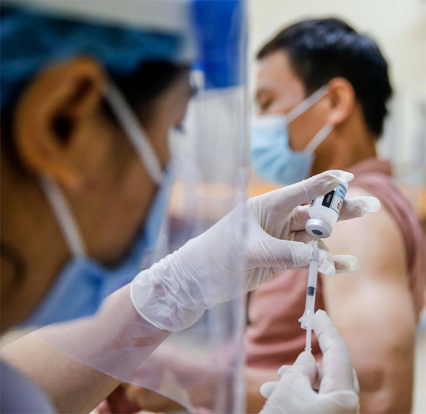 Không có triệu chứng gì sau tiêm phòng Covid-19 có phải là vắc-xin không hiệu quả?-1