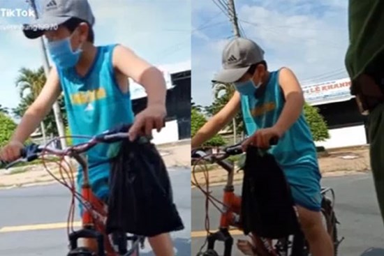 Cậu bé đạp xe xin qua chốt để đưa đồ cho ngoại, khi được hỏi 