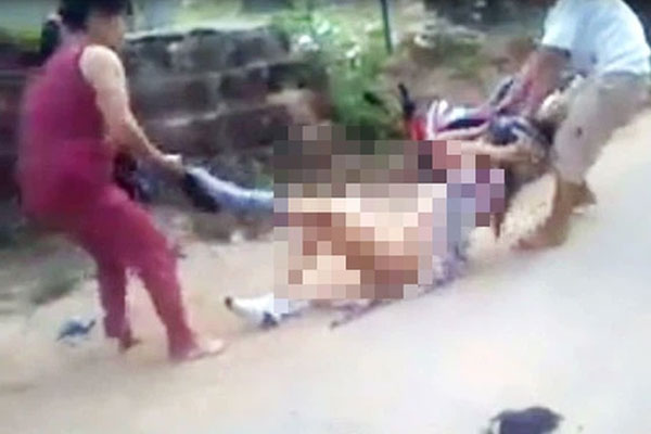 Diễn biến bất ngờ vụ người phụ nữ bị đánh đập, lột hết áo quần quay clip tung lên mạng-1