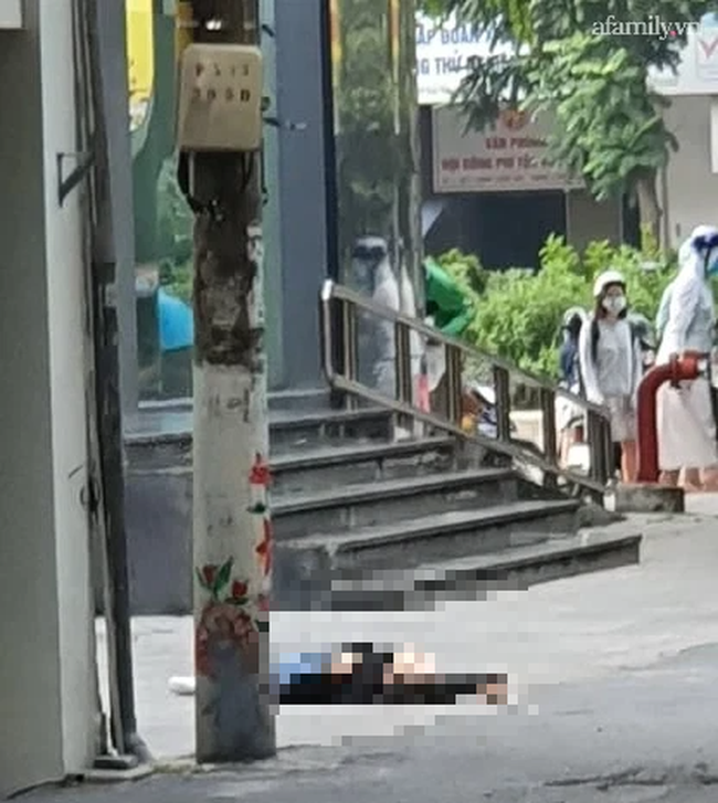 Hà Nội: Người phụ nữ trẻ rơi từ tòa nhà văn phòng xuống đất tử vong, y tế đang lấy mẫu test COVID-19-1