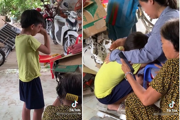 Bé trai đang chơi trong nhà bị ngã đập đầu xuống đất, người phụ nữ thản nhiên ra chụp ảnh làm dân mạng tranh cãi-2