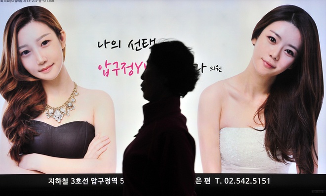 Người phụ nữ Trung Quốc phẫu thuật thẩm mỹ để tránh vận xui cho chồng-1