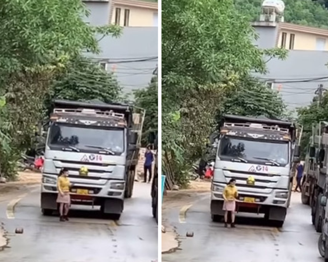 Góc ức chế: Người phụ nữ bình tĩnh nhất trên đường phố, thong thả dạo bước dù xe tải hạng nặng đang đi áp sát phía sau-1