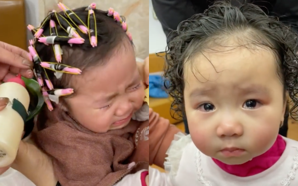 Mặc em bé 1,5 tuổi khóc lóc, người lớn vẫn ép bé làm tóc xoăn khiến ai cũng xót xa, phẫn nộ-1
