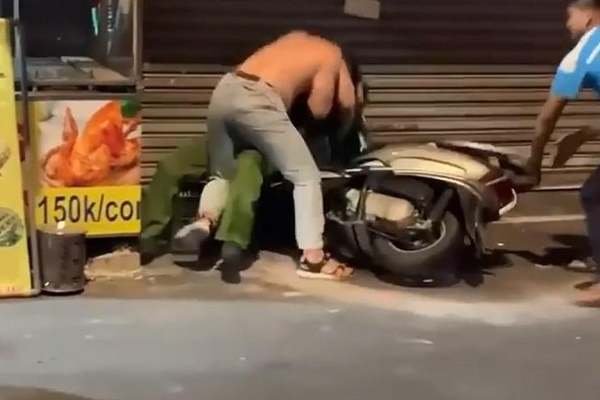 Khởi tố vụ ‘con đánh công an, mẹ quay clip’ đêm mùng 1 ở trung tâm TP.HCM-1