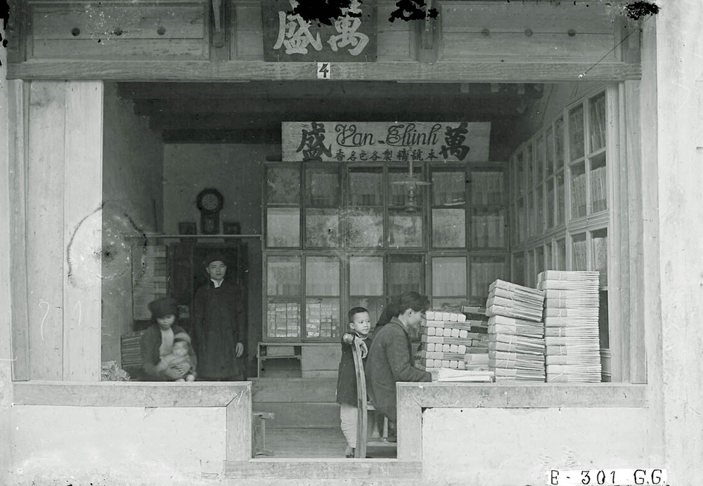 Hình ảnh cực hiếm về Tết Hà Nội cách đây 100 năm: Cả 1 thế kỉ sao vẫn thấy bồi hồi, thân thương đến lạ-16