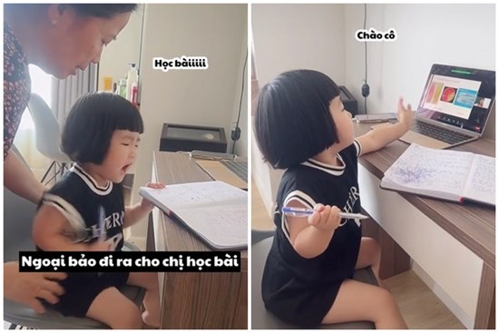 Bé gái mải mê học bài, dù bị mắng vẫn nhất quyết không rời bàn học, ngó qua quyển vở mà