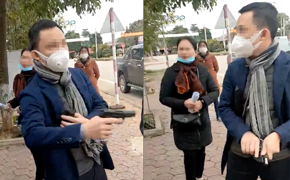 Người đàn ông cầm súng uy hiếp người khác lúc chuyển nhượng sổ đỏ ở văn phòng công chứng-1