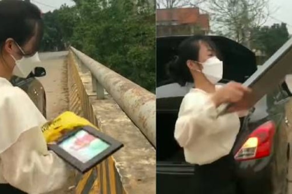 Clip: Cô gái dừng ô tô trên cầu rồi thản nhiên vứt hết ảnh cưới xuống sông khiến dân tình chỉ trích dữ dội-1