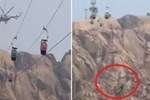 Cáp treo đứt dây giữa chừng khiến 8 người treo lơ lửng ở độ cao 274 mét, phải điều cả trực thăng đến cứu nạn-2