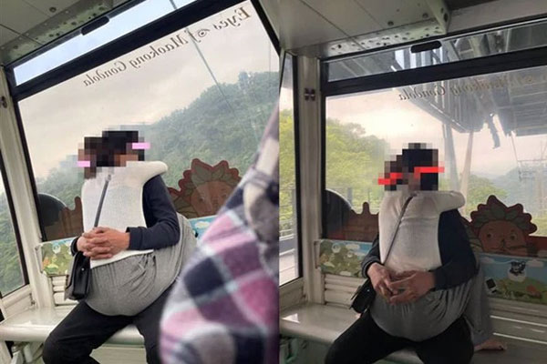 Ngồi ôm nhau âu yếm với tư thế khó đỡ trong cáp treo công cộng, cặp đôi khiến dân mạng nóng mắt, chỉ trích hết lời-1