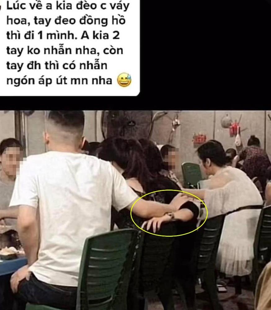 Lan truyền clip chồng lén lút nắm tay bồ ngay sau lưng vợ tại bàn ăn, xung quanh có nhiều bạn bè-4