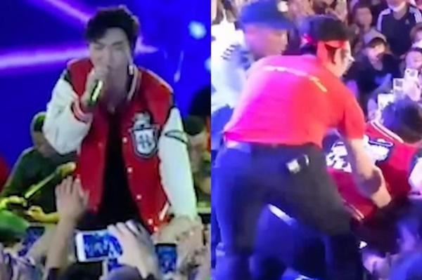 Erik bị fan kéo ngã khi đang hát trên sân khấu-1