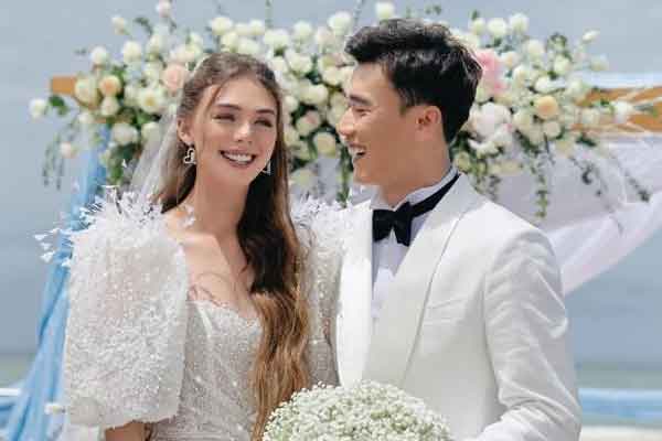 Vợ Tây của Bùi Tiến Dũng gây tranh cãi vì nghi vấn mặc lại váy cưới của mình đi dự đám cưới người khác-12