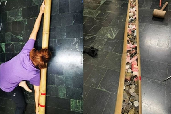 Tài xế taxi vác túi tiền xu tiết kiệm suốt 5 năm đi mua vàng tặng vợ-1