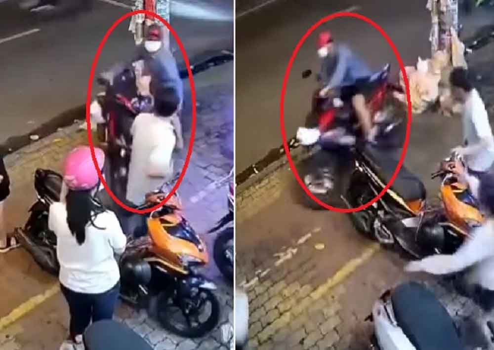 Đạo tặc ngang nhiên cướp xe máy trước mặt nhiều người ở TP.HCM-1