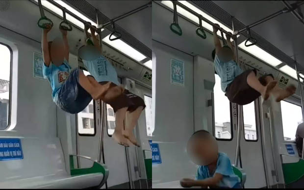 2 bé trai đánh đu trên tàu Cát Linh - Hà Đông, thái độ cổ vũ của người lớn đi cùng càng khiến nhiều người bức xúc-2