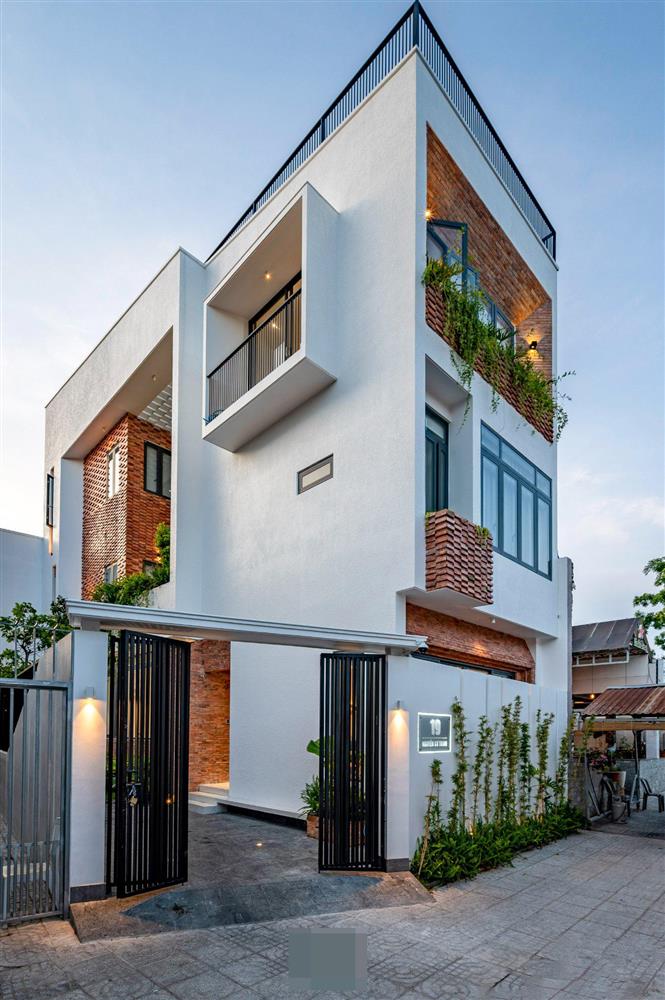 Tổ ấm của gia đình 3 thế hệ với không gian xanh và mảng tường gạch nung hoài cổ-2