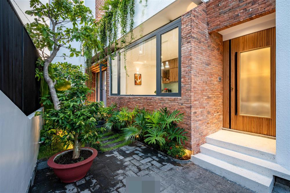 Tổ ấm của gia đình 3 thế hệ với không gian xanh và mảng tường gạch nung hoài cổ-14