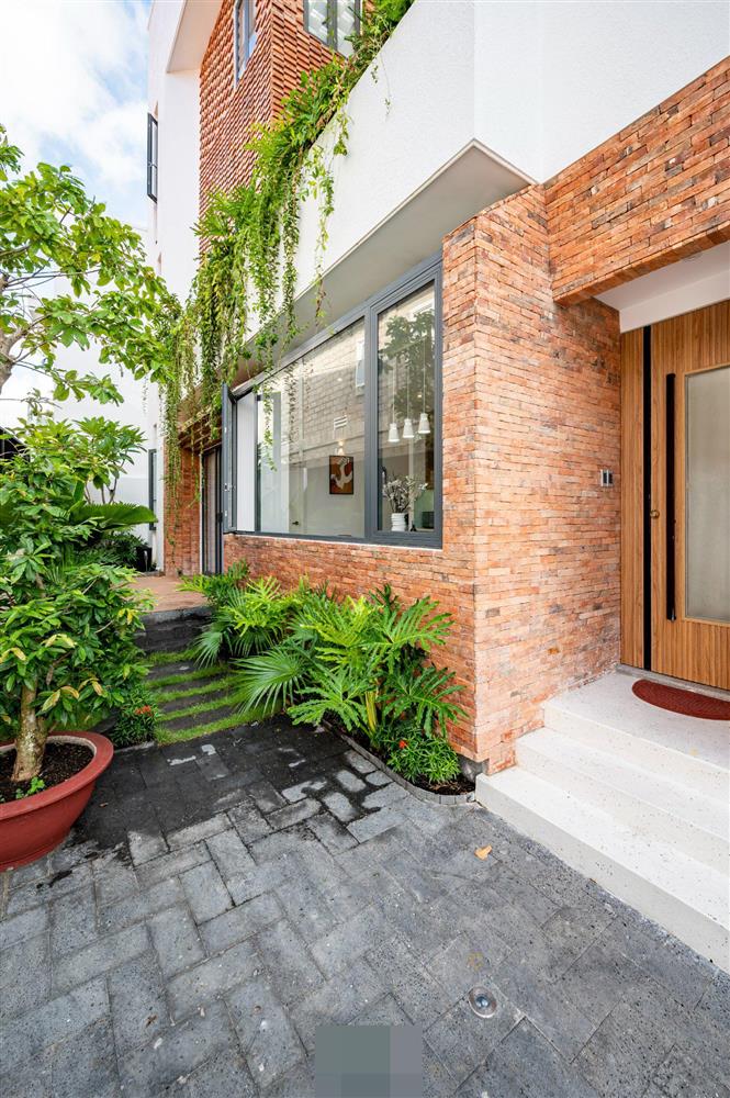 Tổ ấm của gia đình 3 thế hệ với không gian xanh và mảng tường gạch nung hoài cổ-38