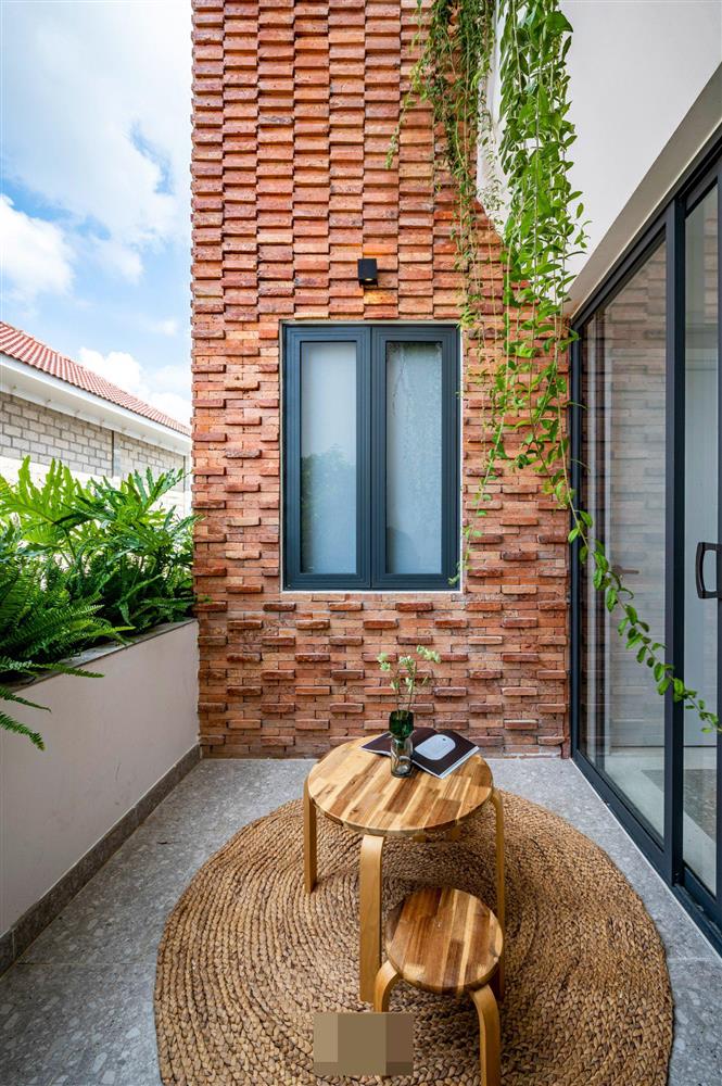 Tổ ấm của gia đình 3 thế hệ với không gian xanh và mảng tường gạch nung hoài cổ-39