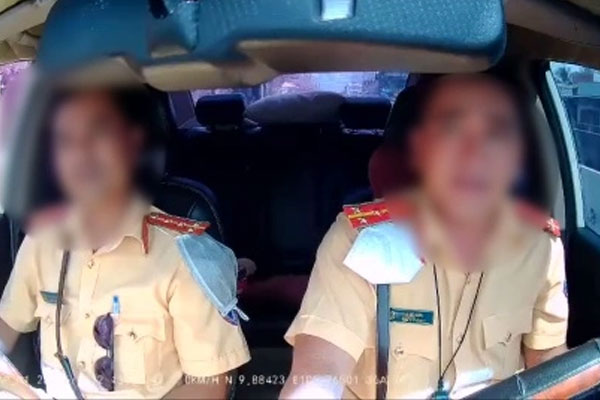 Kỷ luật 2 CSGT liên quan vụ văng tục, gọi điện khi lái xe-2