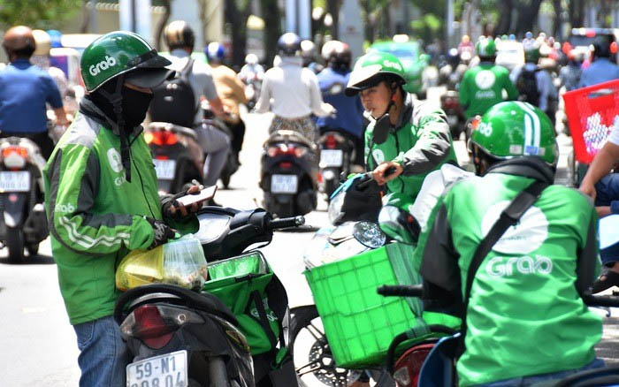Grab thu phụ phí nắng nóng: Bộ Công Thương sẽ vào cuộc-1