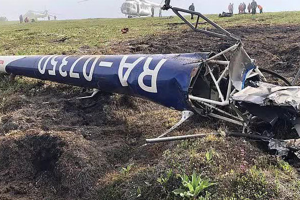 Trực thăng rơi, vợ chồng doanh nhân Nga và phi công bị gấu ăn thịt-3