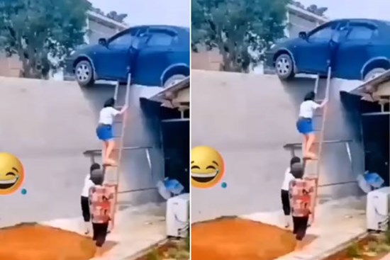 Người phụ nữ 'hạ cánh' ôtô trên nóc nhà, phải nhờ người dân bắc thang lên giải cứu