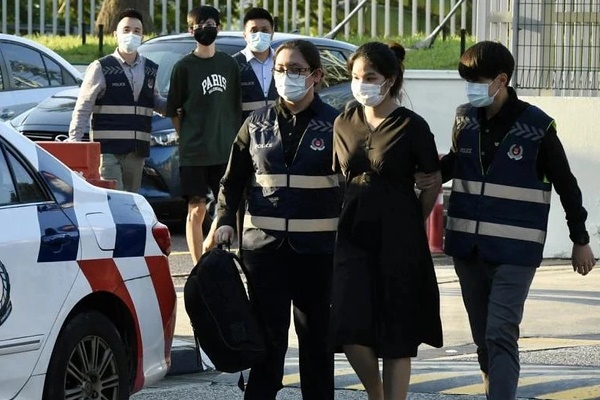 Cặp đôi Singapore lừa đảo 23 triệu USD đồ hiệu đã bị bắt-1