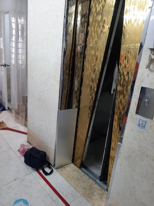 TP.HCM: Cảnh sát phá cửa giải cứu 9 người bị mắc kẹt trong thang máy-1