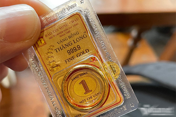 Giá vàng hôm nay 12/9: Vàng mắc kẹt, tăng giảm quay cuồng-1