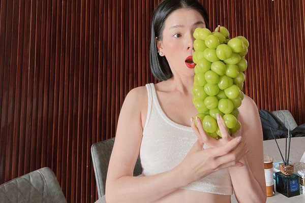 Lệ Quyên mặc lại chiếc áo gây tranh cãi chụp bên Nữ thần tự do-12