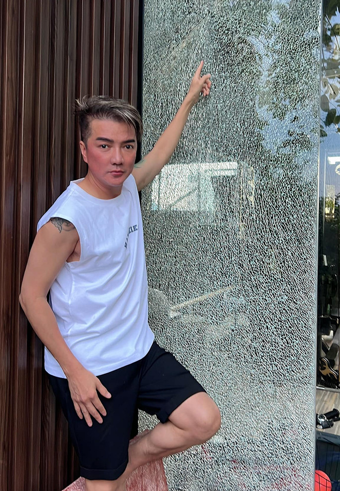 Đàm Vĩnh Hưng báo công an vì nhà bị kẻ lạ bắn súng hơi vỡ cửa kính-1