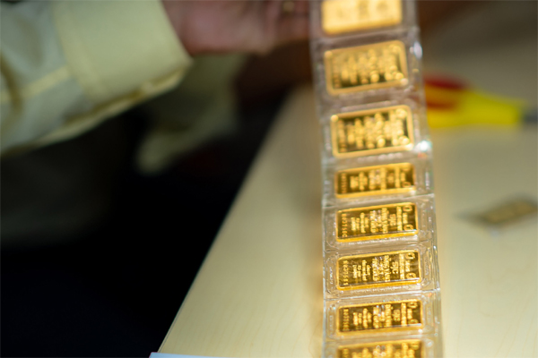 Giá vàng hôm nay 30/9: USD hạ nhiệt, vàng tăng giá-1