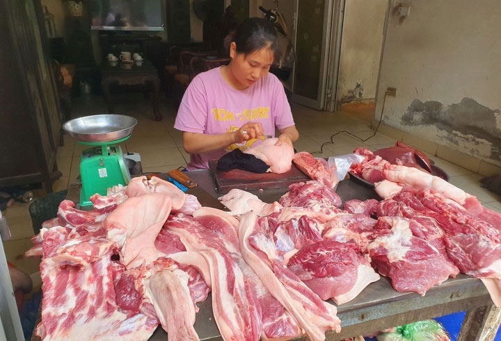 Giá thịt heo ngoài chợ bắt đầu giảm sâu-1