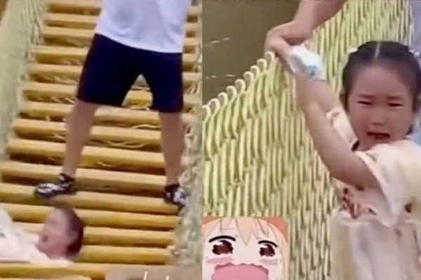 Cha đùa dai làm con gái rơi khỏi cầu treo ở Trung Quốc-1