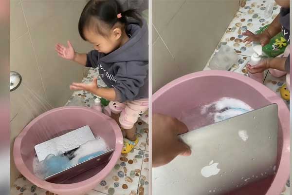 Dở khóc dở cười khi con gái 2 tuổi mang laptop của bố đi rửa cho sạch-1