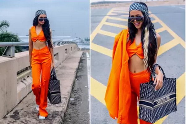 HHen Niê khoe khéo vòng eo 59cm bé xíu với cây đồ cam, thần thái như ngôi sao quốc tế tại sân bay-8