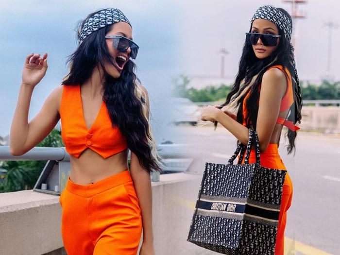 HHen Niê khoe khéo vòng eo 59cm bé xíu với cây đồ cam, thần thái như ngôi sao quốc tế tại sân bay-1