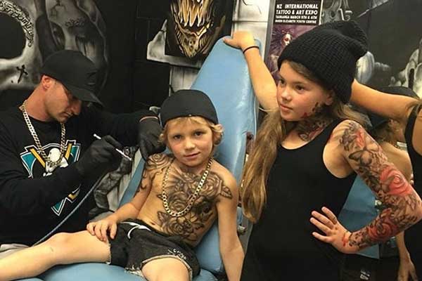 Cặp đôi Mỹ ép con xăm hình, sau đó cắt da để xóa-2