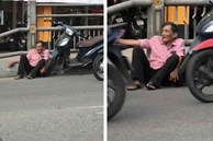 Mạng xã hội lại lan truyền hình ảnh Thương Tín ngồi thất thần trên vệ đường