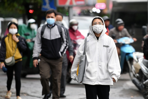 Sáng nay, người dân Thủ đô đón cái rét chính thức sau nhiều ngày chờ đợi-6