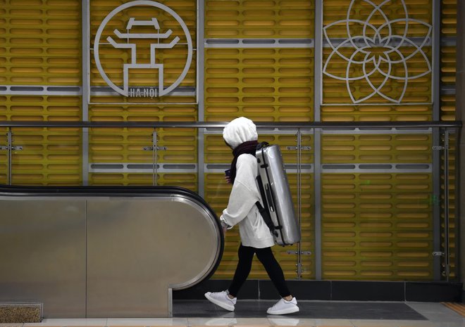 Sáng nay, người dân Thủ đô đón cái rét chính thức sau nhiều ngày chờ đợi-11