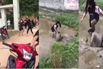 Nữ sinh bị đánh liên tiếp dưới ruộng bùn vì không chào các chị khoá trên-2