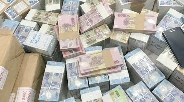 Đổi tiền lẻ, tiền mới để thu lời là trái pháp luật-1