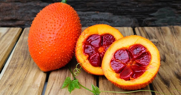 Hướng dẫn cách nấu xôi gấc dẻo thơm, căng bóng, lên màu đỏ đẹp-1