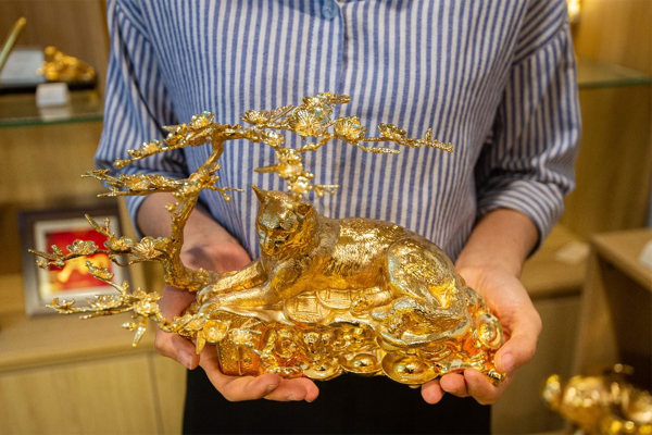 Giá vàng hôm nay 21/2: Mất ưu thế trước sức mạnh đồng USD-1